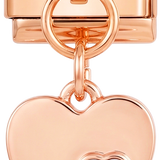 Corazón doble con piedras moradas, en oro rosa