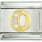 Letra O en oro con piedras, sobre plata